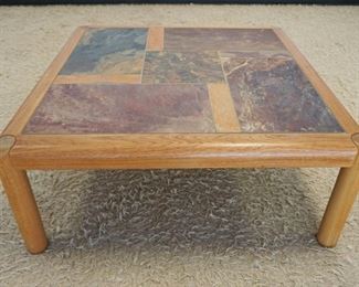 1038	DANISH MODERN COCKTAIL TABLE W/INSET STONE TOP, APPROXIMATELY 41 IN SQUARE X 17 IN HIGH
