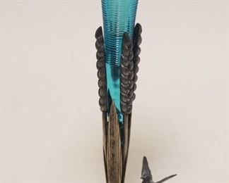 1067	ORNATE VICTORIAN BLUE OPALESCENCE BUD VASE IN A MERIDEN SILVERPLATE HOLDER, APPROXIMATELY 9 IN HIGH
