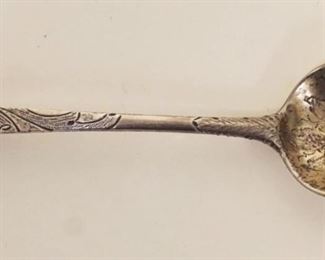 1078	ORNATE CONTINENTAL SILVER SPOON W/EMBOSSED DESIGNS, 1.65 OZT, TOUCH MARKS ON REVERSE
