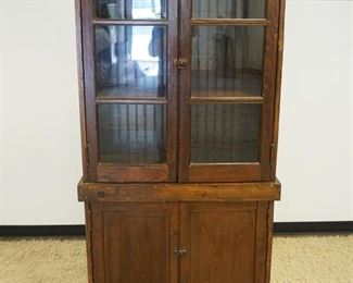 1094	PINE COUNTRY KITCHEN CUPBOARD W/2 GLASS DOORS OVER 2 WOOD DOORS, APPROXIMATELY 34 IN X 13 IN X 77 IN HIGH
