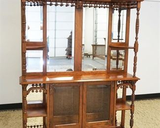 1098	VICTORIAN ETAGERE W/BEVELED GLASS DOORS & MIRRORS, APPLIED CARVED CREST & STICK & BALL TRIM, APPROXIMATELY 51 IN X 12 IN X 75 IN HIGH
