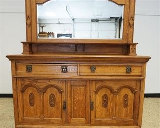 1100	VICTORIAN OAK MIRROR BACK SERVER W/CARVED PANELED DOORS, MISSING PULLS, APPROXIMATELY 60 IN X 23 IN X 73 IN HIGH
