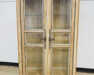 1109	FRENCH PROVINCIAL CRYSTAL CABINET W/ADJUSTABLE SHELVES & BEVELED GLASS DOORS, APPROXIMATELY 18 IN X 44 IN X 80 IN
