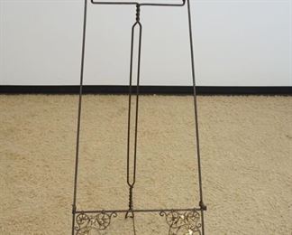 1121	ORNATE VICTORIAN STYLE BRASS & IRON EASLE, APPROXIMATELY 64 IN HIGH
