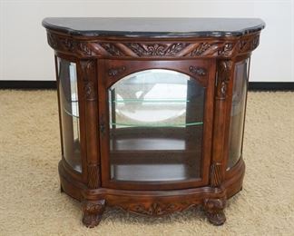 1124	ORNATE MARBLE TOP DISPLAY CABINET W/MIRROR BACK & BEVELED GLASS DOOR & SIDES, APPROXIMATELY 48 IN X 15 IN X 43 IN HIGH
