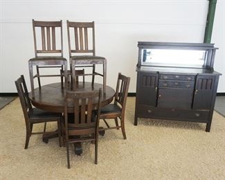 1135	MISSION OAK DINING ROOM SET INCLUDING 6 CHAIRS, 45 IN ROUND TABLE & SIDEBOARD W/MIRROR TOP, APPROXIMATELY 50 IN X 21 IN X 55 IN HIGH
