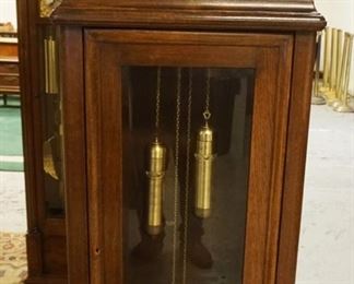 1139	GERMAN GRANDFATHERS CLOCK IN OAK CASE W/APPLIED CARVINGS ON BONNET, NO PENDULUM, APPROXIMATELY 25 IN X 12 IN X 77 IN HIGH
