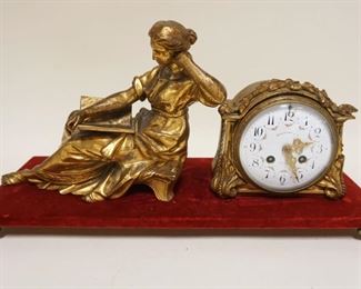 1149	FRENCH GILT METAL CLOCK & FIGURE CLOCK FACE MARKED STEWART & CO NEW YORK FRANCE, MOVEMENT STAMPED PH BLONDE 70 RD ANGOULLME PARIS, APPROXIMATELY 9 IN X 21 IN X 10 IN HIGH
