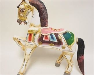 1175	TABLE TOP CARVED CAROUSEL HORSE, APPROXIMATELY 22 IN X 24 IN HIGH
