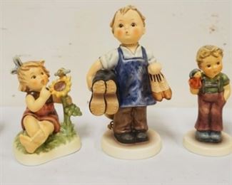 1185	LOT OF 7 HUMMEL FIGURES, LARGEST APPROXIMATELY 5 1/2 IN
