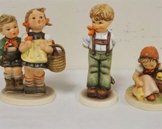 1187	LOT OF 7 HUMMEL FIGURES, LARGEST APPROXIMATELY 6 IN
