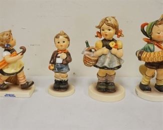 1188	LOT OF 7 HUMMEL FIGURES, LARGEST APPPROXIMATELY 5 IN
