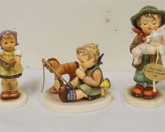1189	LOT OF 7 HUMMEL FIGURES, LARGEST APPROXIMATELY 6 IN
