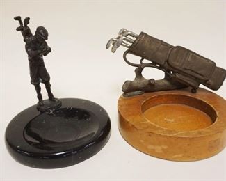 1239	2 GOLFING ASHTRAYS, ONE W/CAST METAL FIGURE OF MAN ON CONCAVE MARBLE BASE, OTHER CAST METAL OF GOLF BAG W/REMOVABLE GOLF CLUBS ON WOOD HOLDER, TALLEST APPROXIMATELY 7 1/2 IN HIGH
