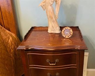 one of two French  style bedside tables