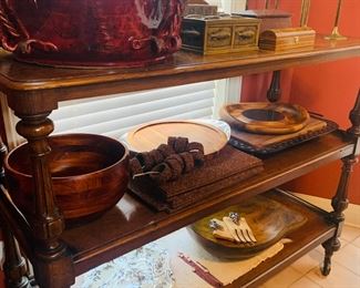 French serving three tiered side board filled with beautiful serving pieces