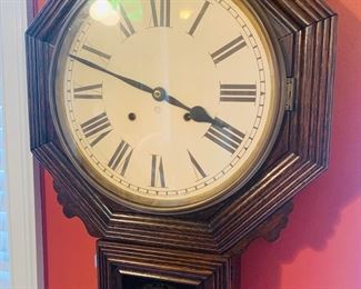 Antique Ansonia key wound school house clock that chimes and keeps time
