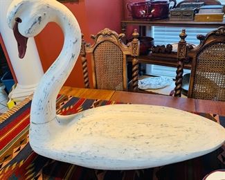 Very large carved wooden swan.