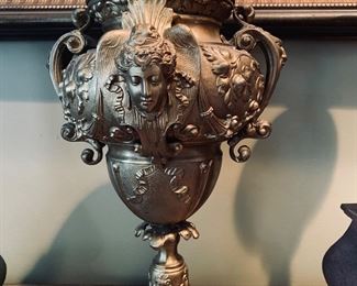 Large Cictorian urn with large busts of ladies faces