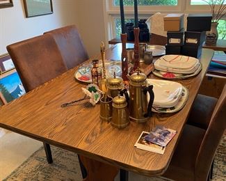 Dinning room table with 8 leather upholster chairs
