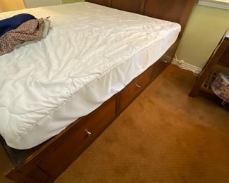 Side picture of King Bassett Bed with storage drawers