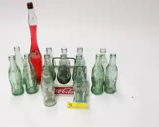 31: Box of Coca Cola Glass Bottles