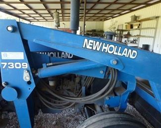 New Holland 7309  w/Front End Loader