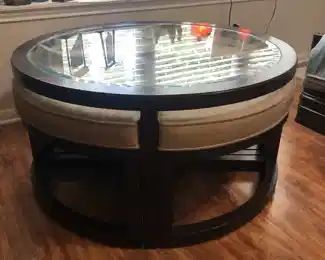 Coffee table with 4 pull out ottomans