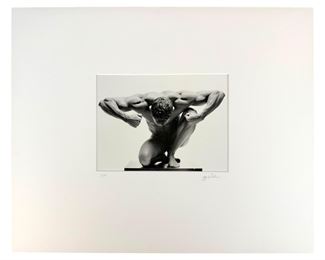 Jeff Palmer (American, born 1948). A limited edition black and white photographic art print. A figural homoerotic work depicting a nude male figure, flexing his muscles in a dramatic pose. Signed lower right, numbered 5/40 lower left. Presented in a decorative frame. Sight size measures approximately 6" x 9". 