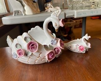 #67		Pair of Porcelain Swans with Hand painted Flowers	($ 20.00)