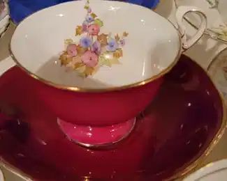 Many English cup and saucer sets