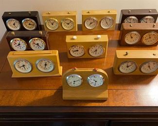 Numerous antique chess clocks and parts.