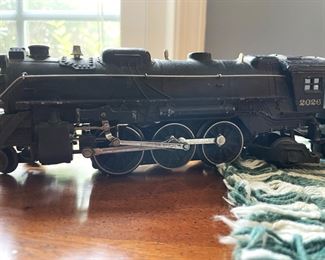 Vintage Lionel Train Engine, Coal Car, Storage Car, Open Car, Caboose and Tracks. 