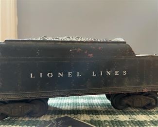 Vintage Lionel Train Engine, Coal Car, Storage Car, Open Car, Caboose and Tracks. 