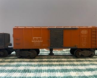 Vintage Lionel Train Engine, Coal Car, Storage Car, Open Car, Caboose and Tracks. 