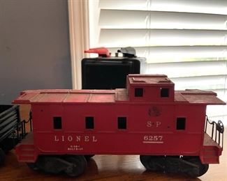 Vintage Lionel Train Engine, Coal Car, Storage Car, Open Car, Caboose and Tracks. 