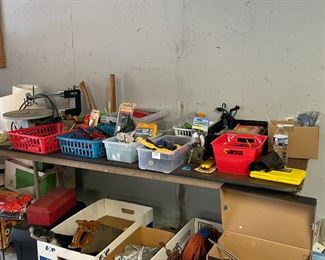 Tons of hand tools, electrical cords, tool boxes