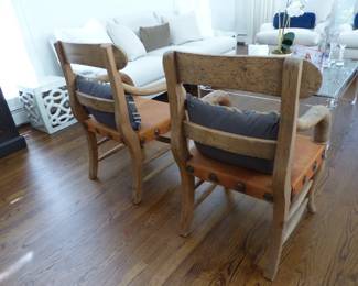 Pair of rustic, leather seats, southwestern accent chairs