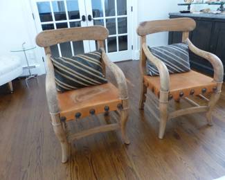 Pair of rustic, leather seats, southwestern accent chairs