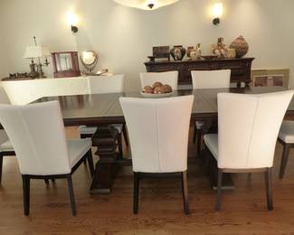 Stunning dining table with 8 chairs from Classic Galleries