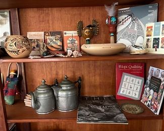 Hopi pottery and gourd rattles.  Antique pewter coffee pots.