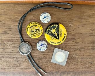 1881 silver dollar bolo tie, 1898 silver dollar,   Emporia State 1956-57 and Wichita East High School booster buttons