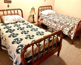 Jenny Lind twin beds and antique quilts