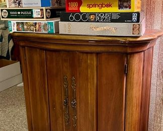 Hardwood cabinet, jigsaw puzzles