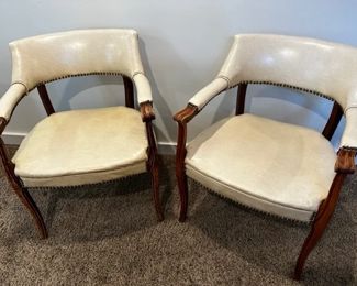 Vintage white leather club chairs with rivet detailing