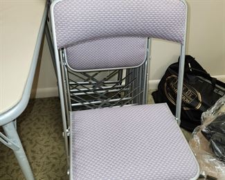 set of padded, folding chairs (12)