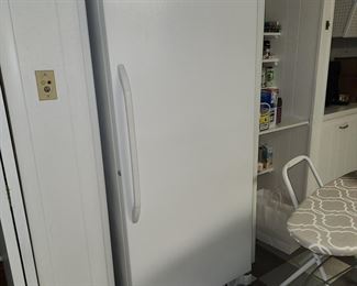 full size GE upright freezer, works perfectly. Easy removal from basement door right next to it (BUYER MOVES)