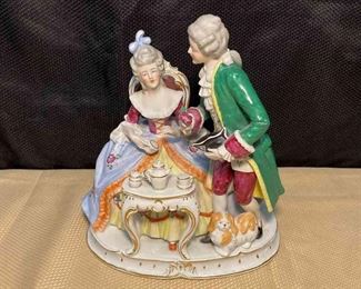Porcelain Figures A Lady, A Gentlemen, And A Dog