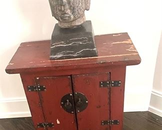 Large antique stone Buddha head on marble base