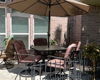 Patio Table with Glass Top, Umbrella and four chairs